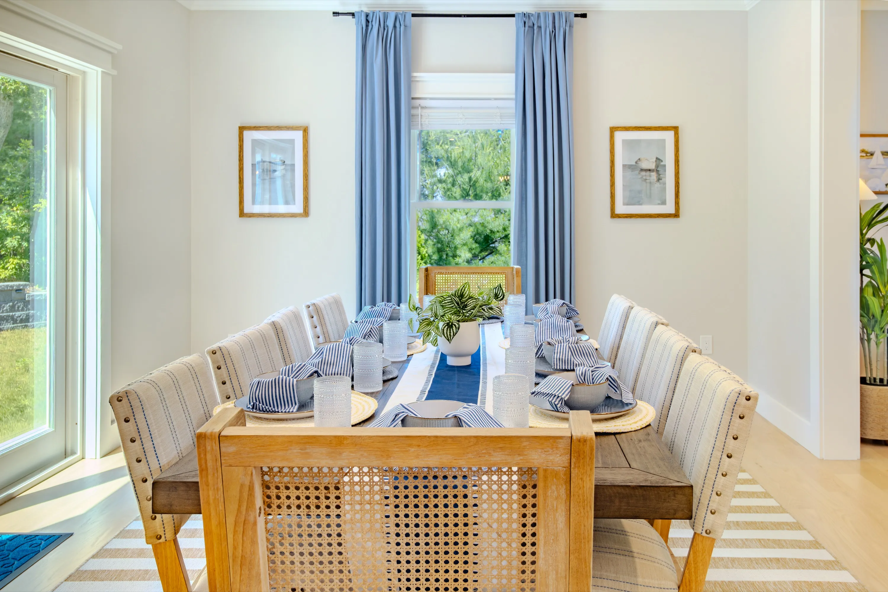 The dining room at Lakewind House, set for a family dinner